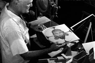 Earl Gresh at work in his St. Pete shop at the Wood Parade.